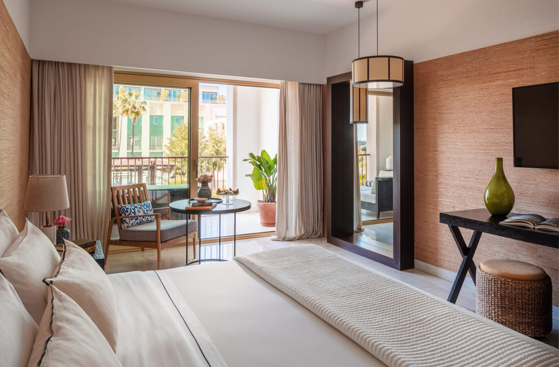 Victoria_Golf_Resort_&_Spa_Palms_Suite_Over_Bed_To_Balcony